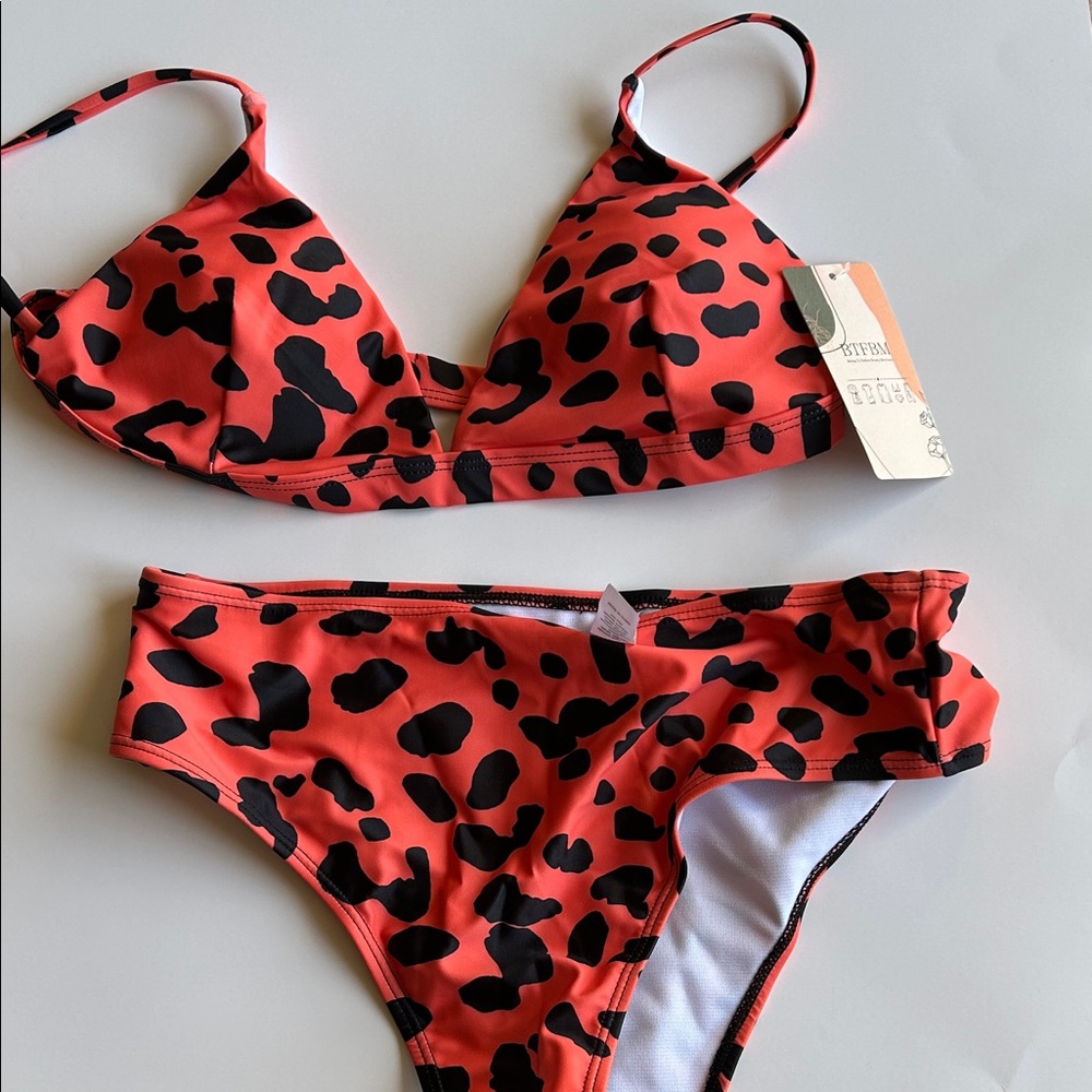 NWT Orange and Black Leopard Print Bikini
Size Medium